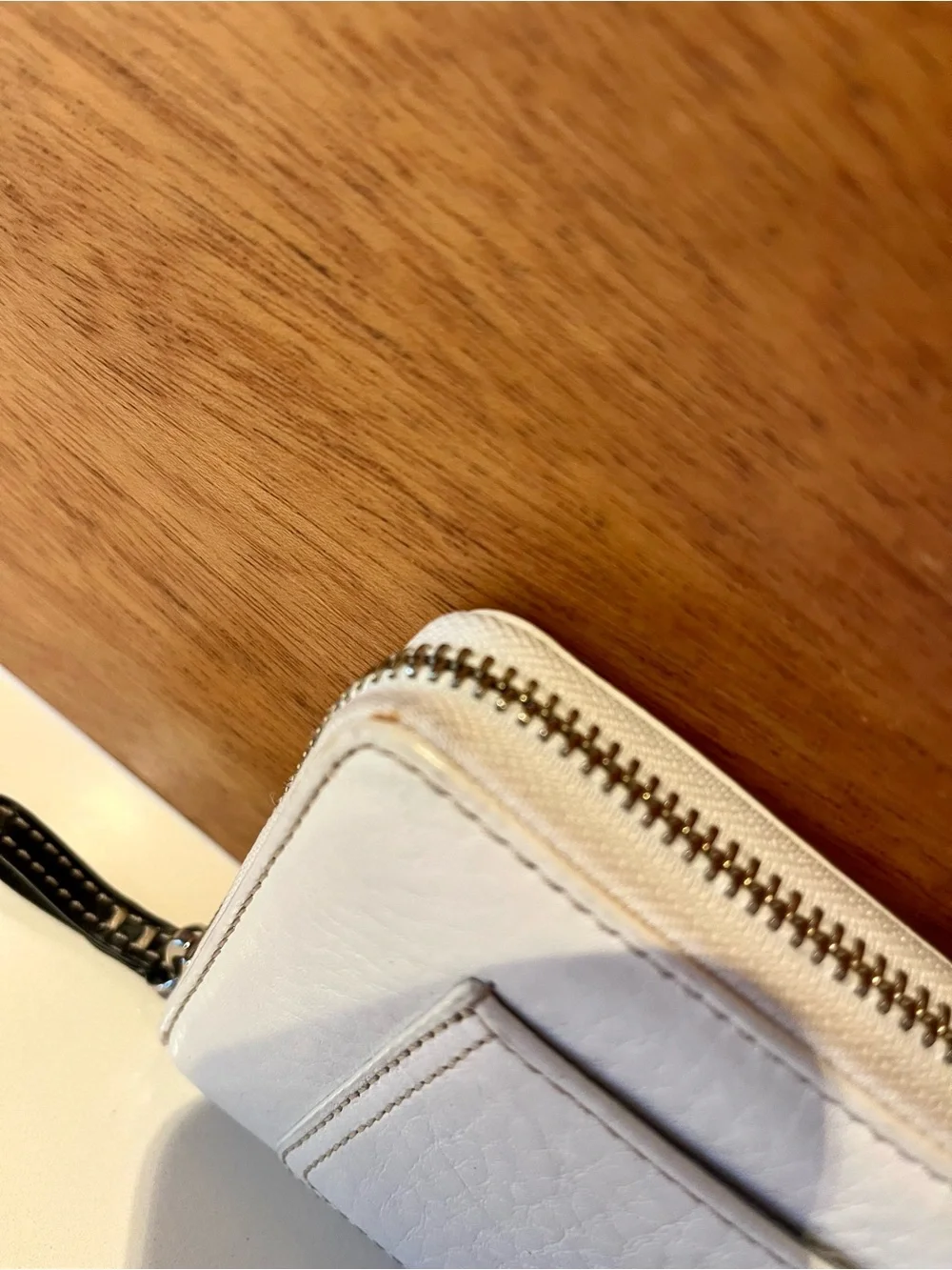 Coach white pebbled leather zip-around wallet